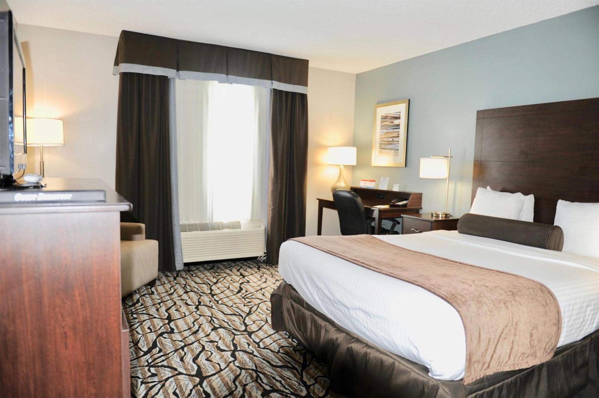 Days Inn & Suites By Wyndham ואוסאו מראה חיצוני תמונה